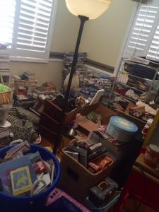 Yep! Call us hoarders! That WAS one of our rooms! Granted, we were having hard wood floors installed so we had to move a bunch of stuff from room to room, but then is when I knew that we needed a declutter buster plan! 
