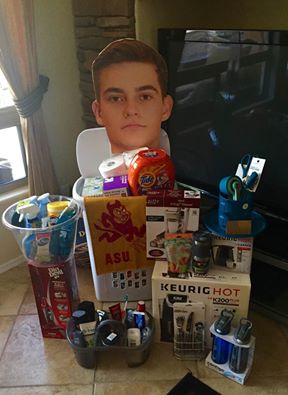 My son's surprise dorm room essentials kit put together by his sweet girlfriend and by me. Guilty of placing his face sign there! That was me and he loved the surprise...except for the face poster. LOL! 
